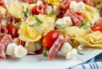 Tortellini Skewers: Bite-Sized Appetizer with Pesto and Cherry Tomatoes