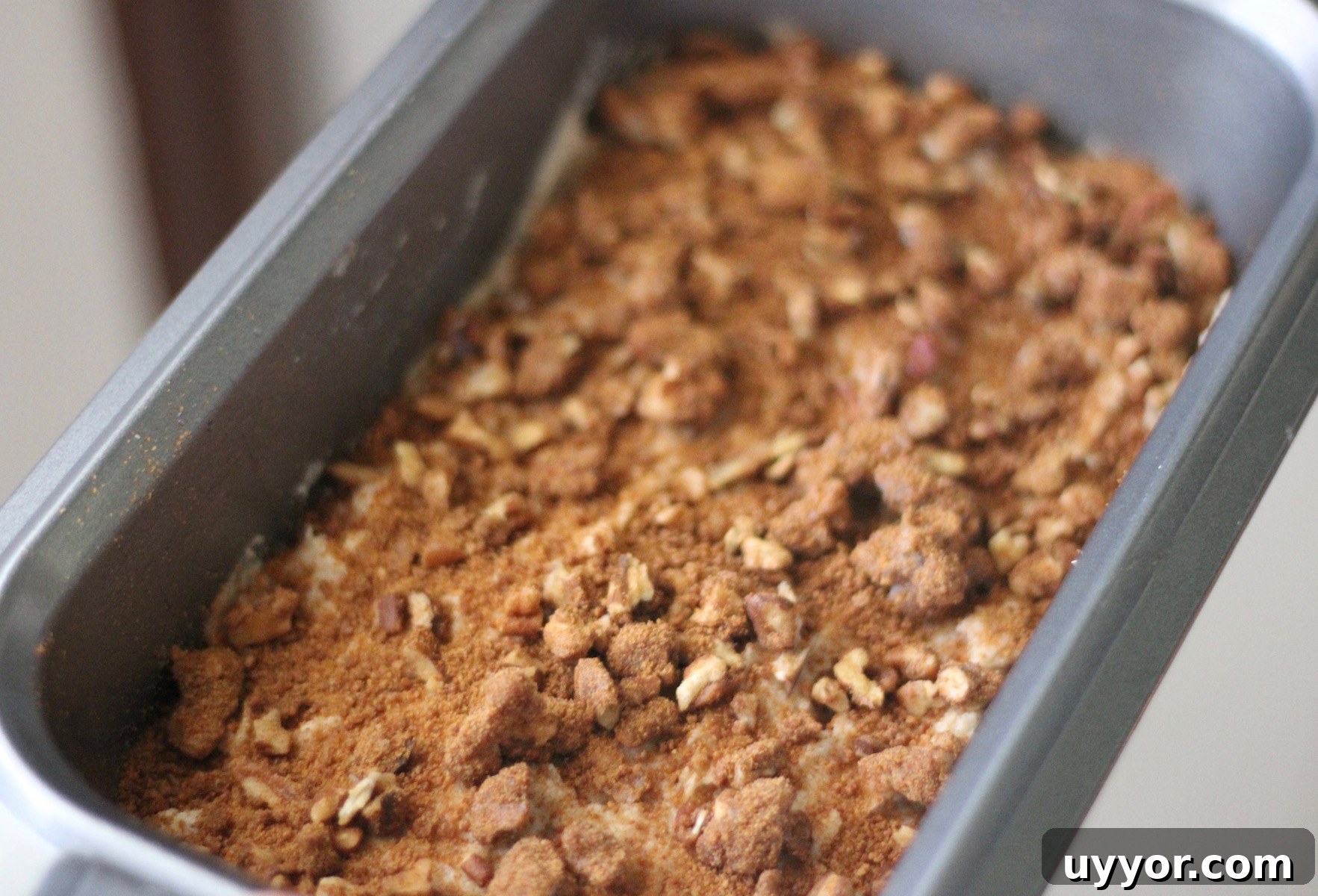 Grain-Free Streusel Banana Bread - your house will smell heavenly when you bake this banana-filled loaf topped with cinnamon and pecan streusel! | fedandfulfilled.com