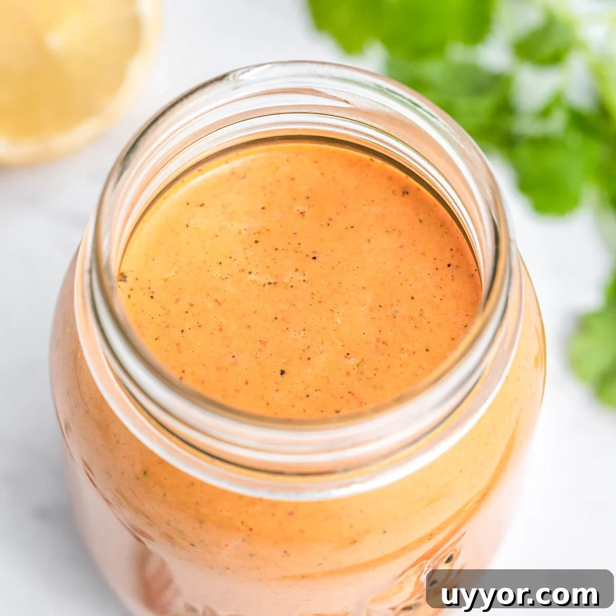 a jar filled with peri peri sauce.