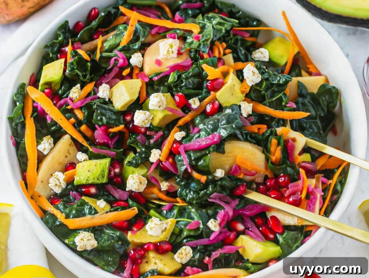 25 Cozy Apple Recipes That Capture Fall Flavors 22 Healthy Mediterranean kale salad topped with feta apple carrot avocado and red cabbage.