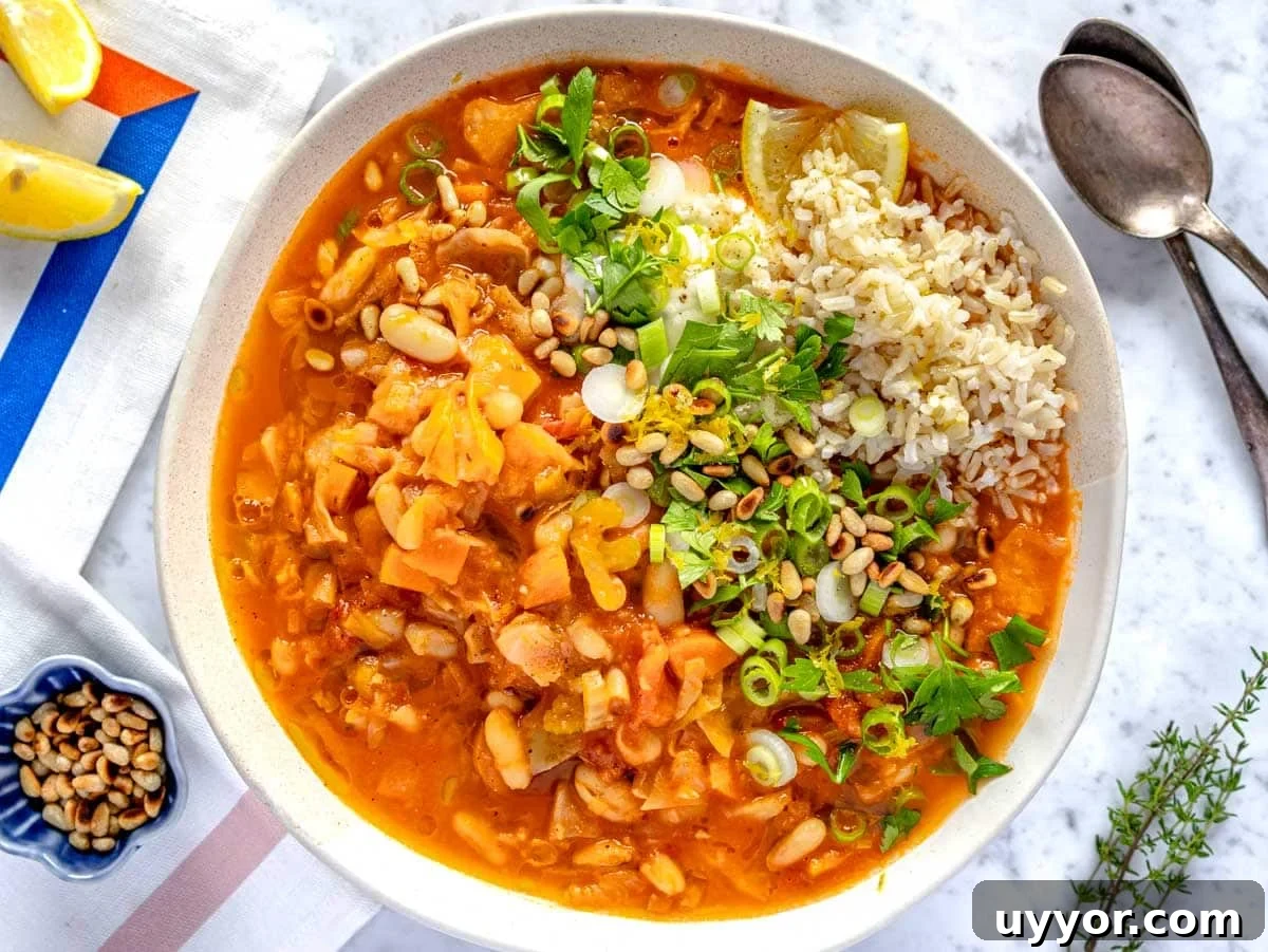25 Cozy Apple Recipes That Capture Fall Flavors 25 Cabbage soup in a white bowl.