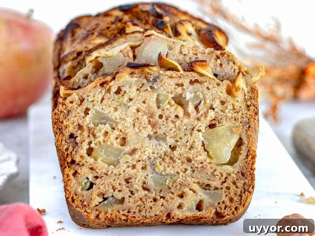 25 Cozy Apple Recipes That Capture Fall Flavors 9 A moist slice of apple bread.