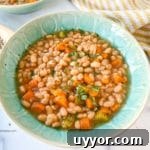 a green bowl of navy beans instant pot.