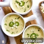 three bowls of creamy spicy soup.