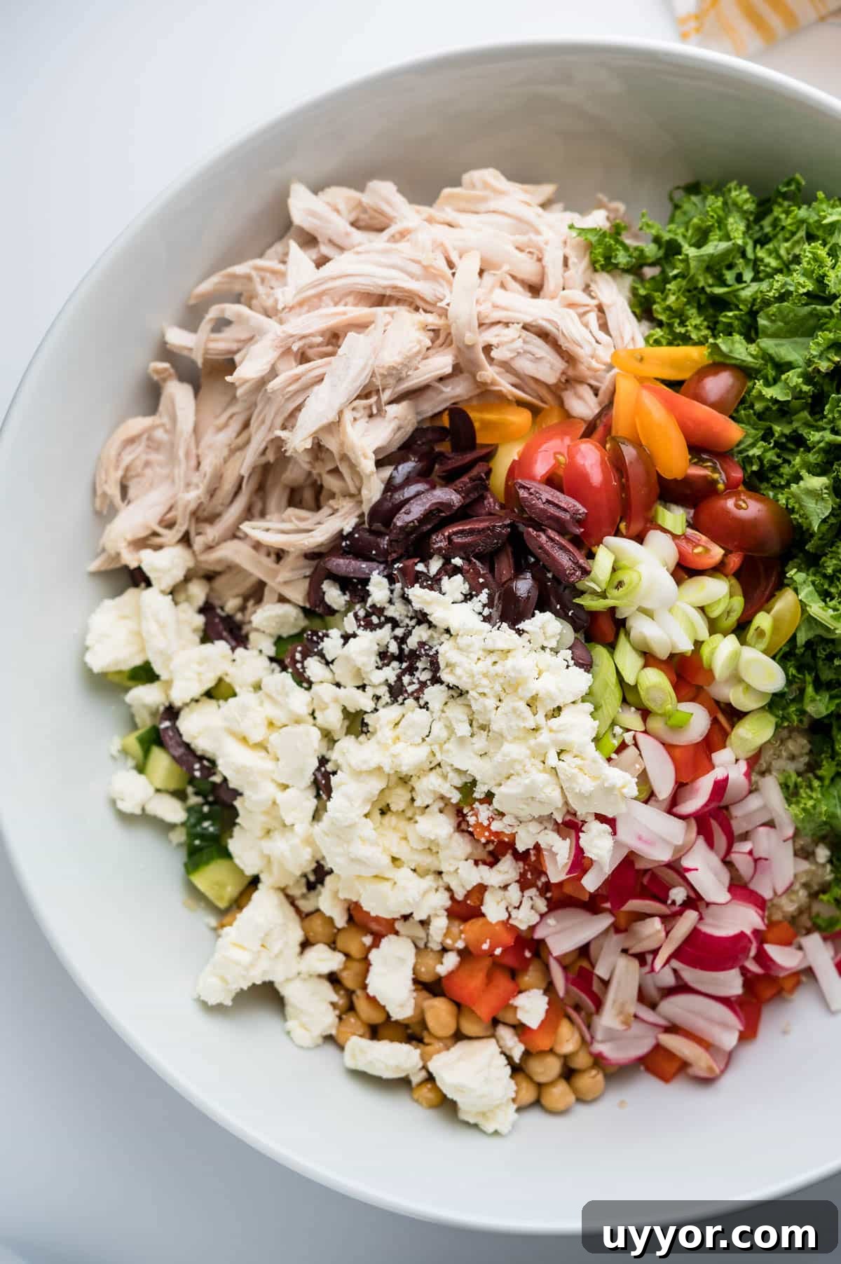 assembling the ingredients in a large shallow bowl.