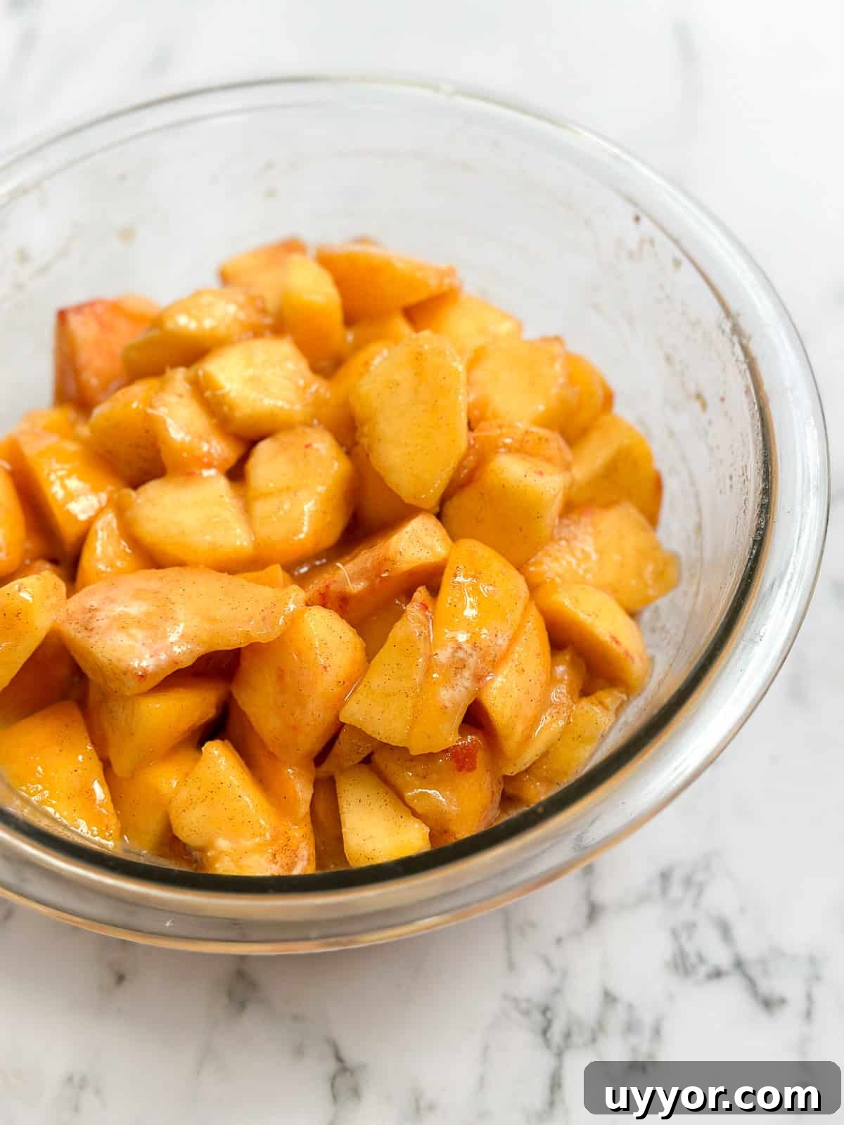 Brown Butter Peach Crisp Recipe — Warm Summer Dessert 11 a closeup of the peaches.