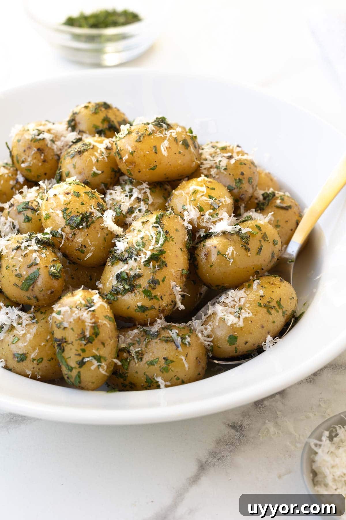 Buttery Baby Dutch Yellow Potatoes Recipe for Tender Roasted Spuds 2 Baby Dutch yellow potatoes with herbs and parmesan.