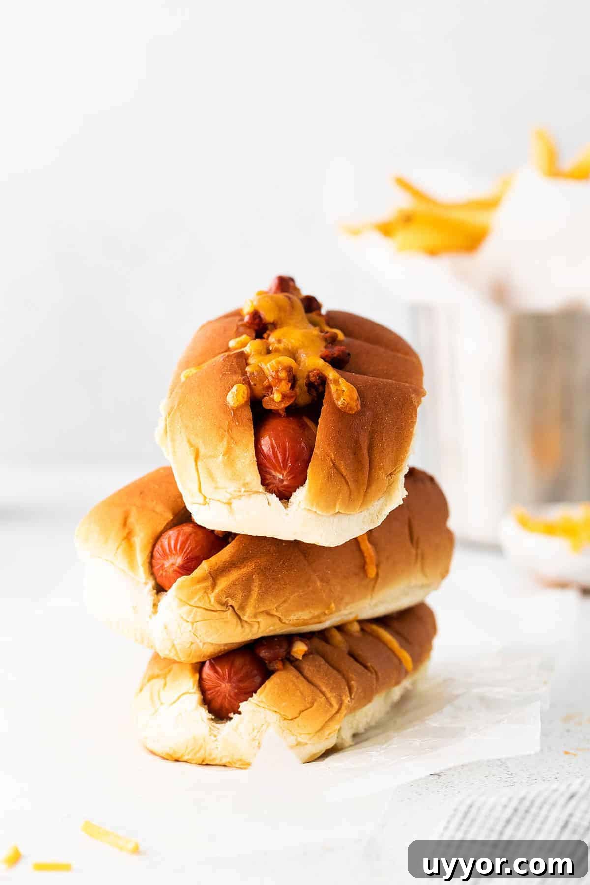 Chili cheese dogs Stack of chili cheese dogs.