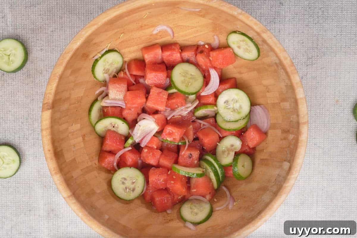 Authentic Thai Watermelon Salad Recipe for Summer Flavor 5 Dressing mixed with the salad.
