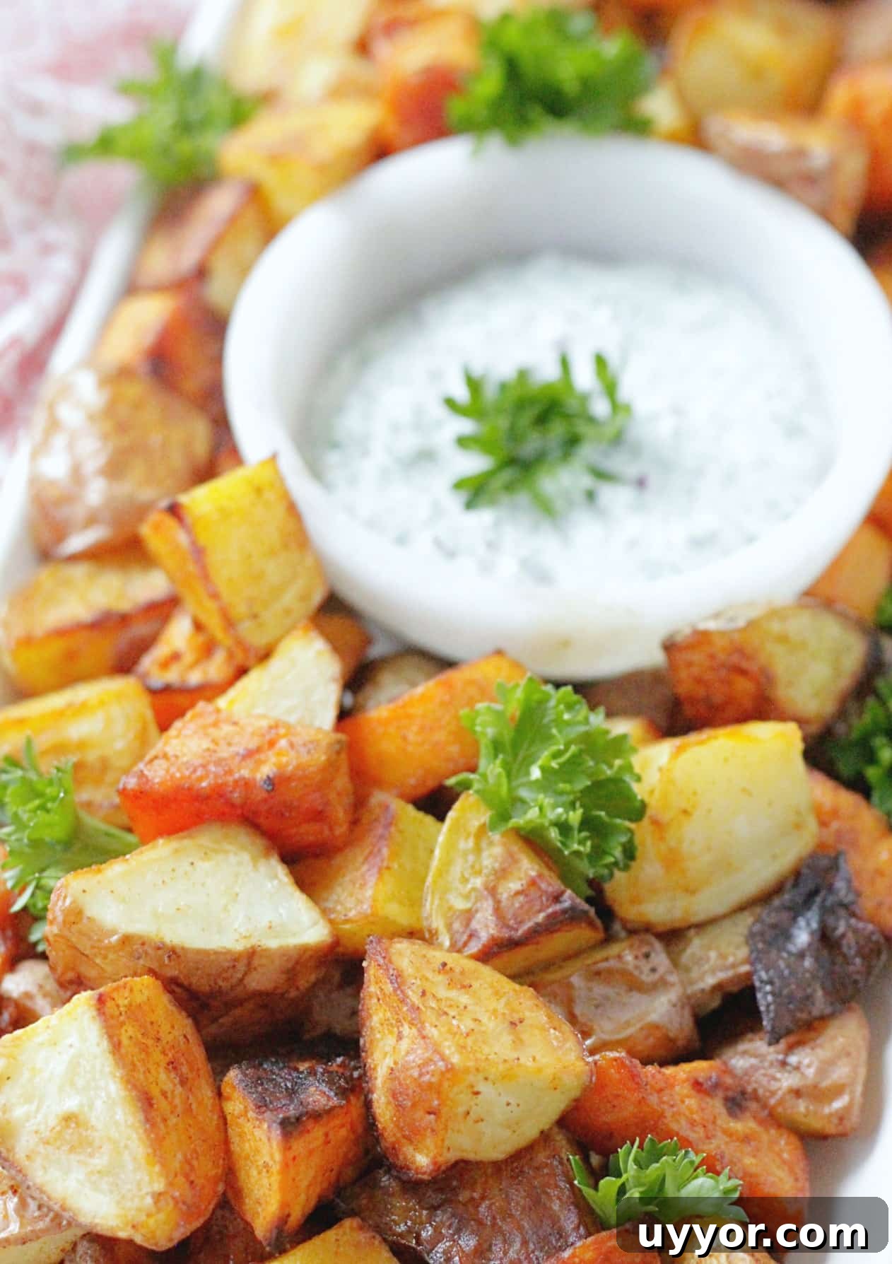 Crispy Oven-Roasted Potatoes with Creamy Herb Dipping Sauce 5 perfect oven roasted potatoes with dipping sauce