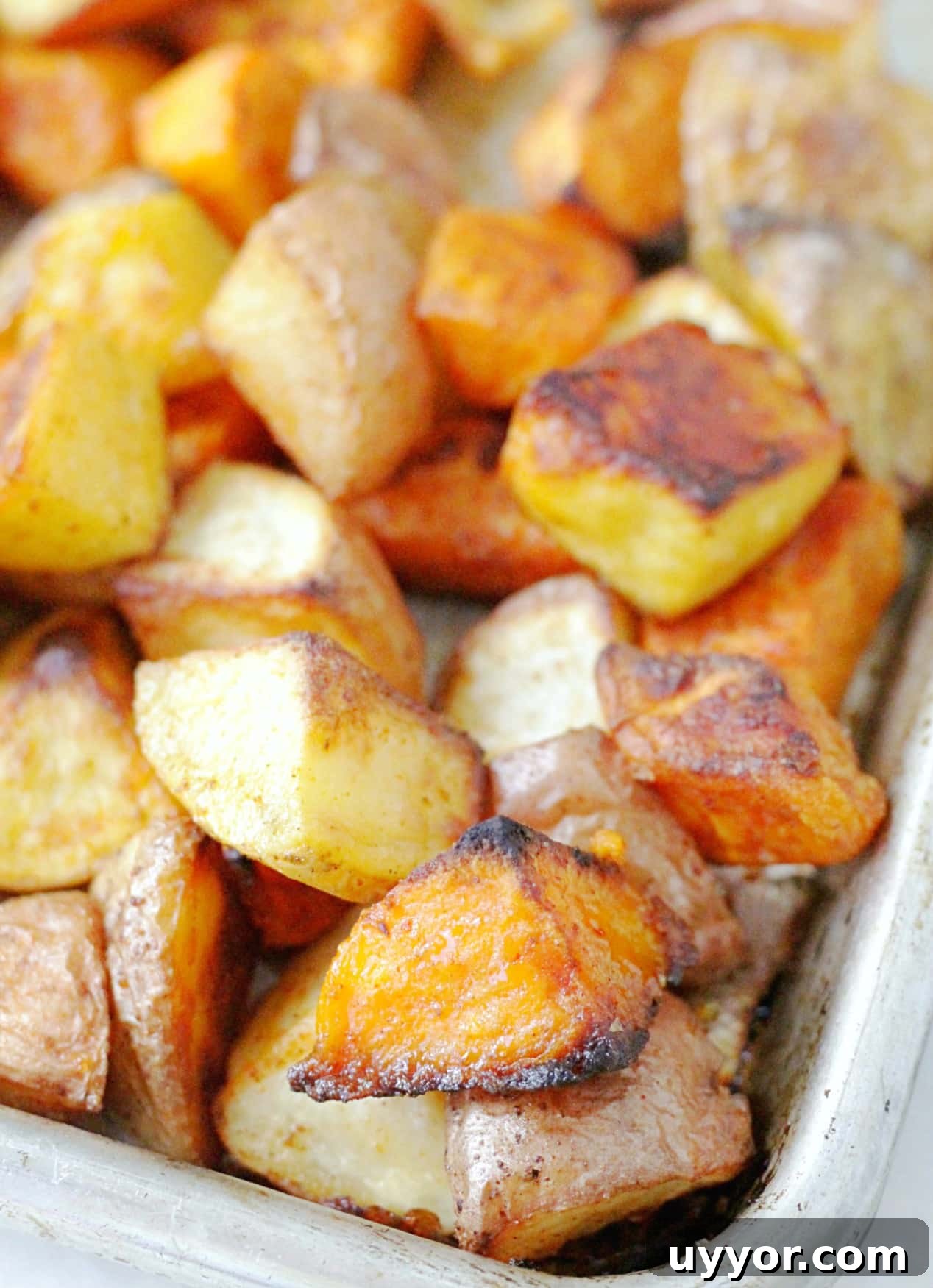 Crispy Oven-Roasted Potatoes with Creamy Herb Dipping Sauce 6 close up of perfect oven roasted potatoes on sheet pan