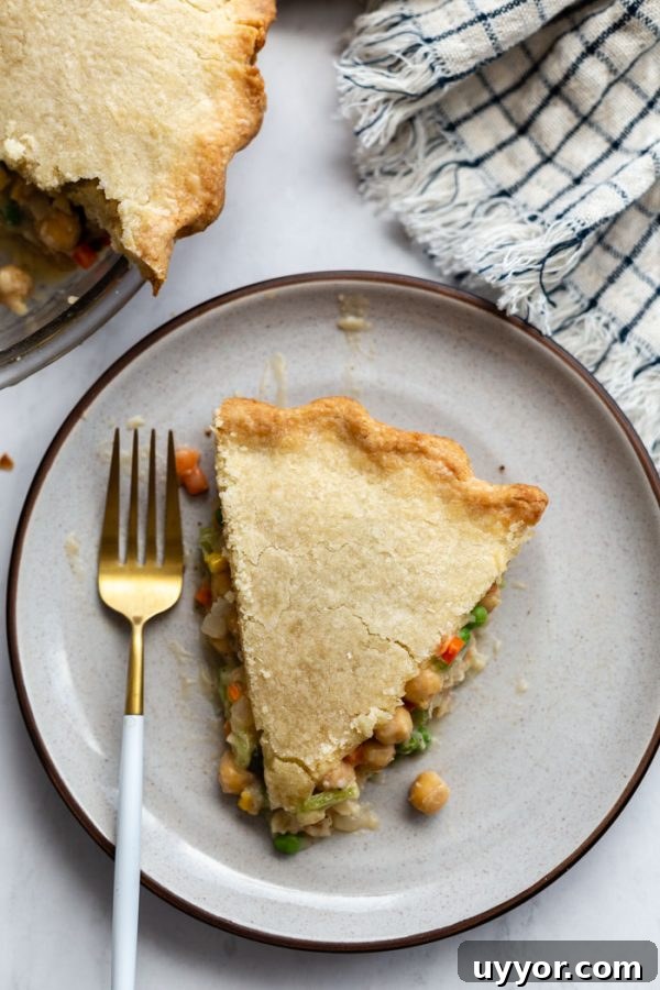 Hearty Chickpea Pot Pie (Vegan Comfort Dish) 4 top down shot of pot pie on a plate and white background