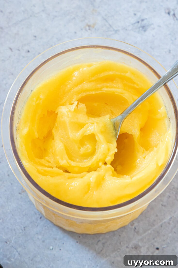 Ninja Creami mango sorbet in a container