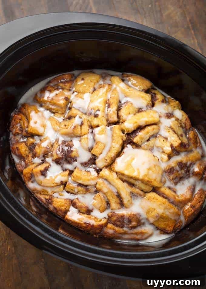 Crockpot Cinnamon Roll Casserole: Gooey Breakfast Baking Recipe 2 Cinnamon Roll Casserole in slow cooker