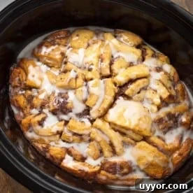 Slow Cooker Cinnamon Roll Casserole in cooker