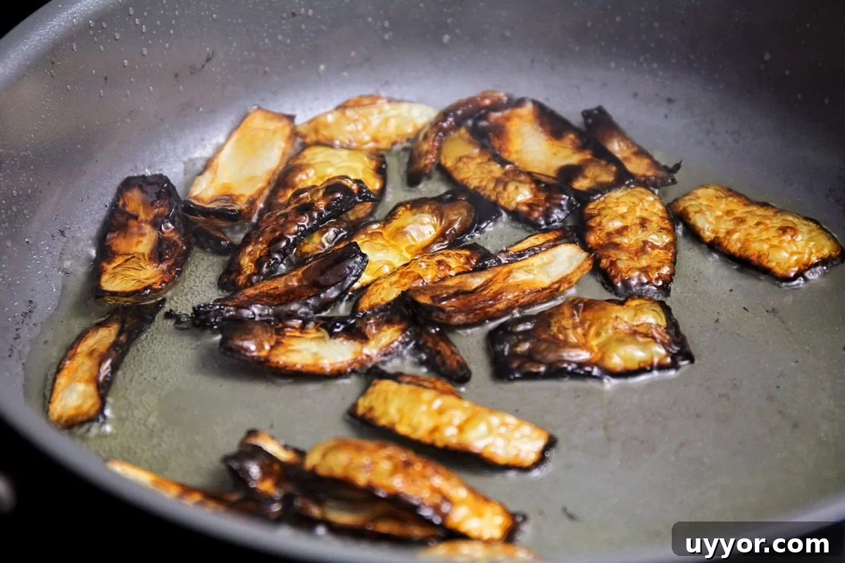Onion fried until blackened for pupusas filling.