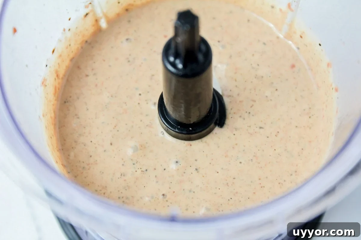Pupusas filling mixed together in blender.