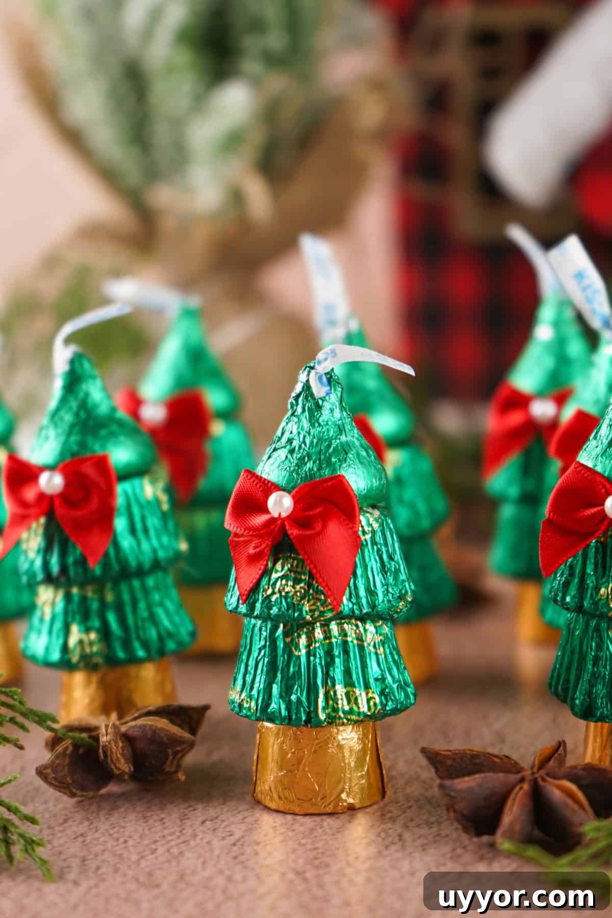 These Reese's Peanut Butter Cup Christmas Trees are so fun and easy to make. Candy Christmas Trees