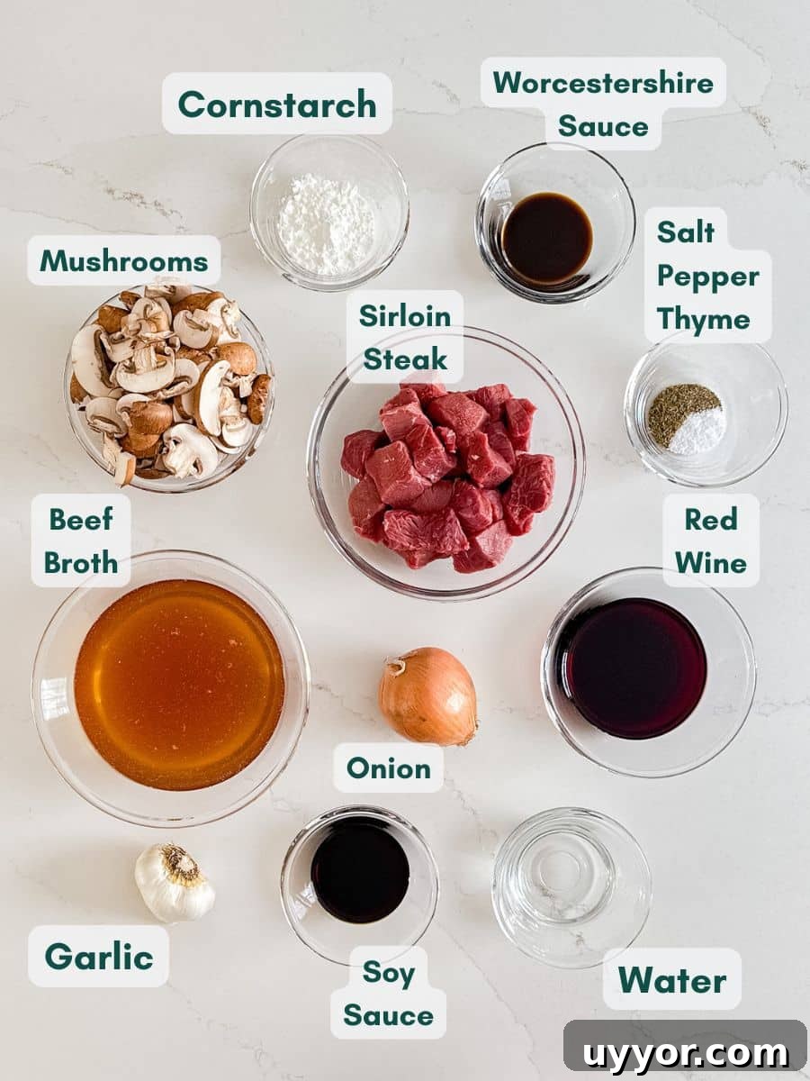 Instant Pot Beef Tips with Rich Mushroom Gravy 4 An overhead image of labeled recipe ingredients.