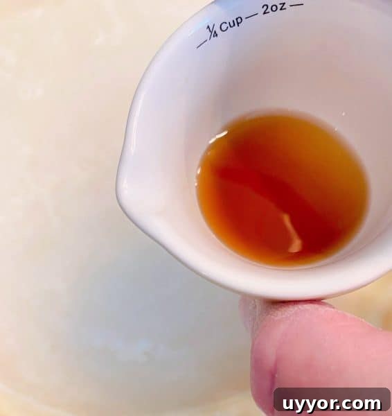 Classic Depression-Era Water Pie Recipe You Can Make Today 6 Vanilla extract in a small measuring cup sprinkled over water mixture of pie.