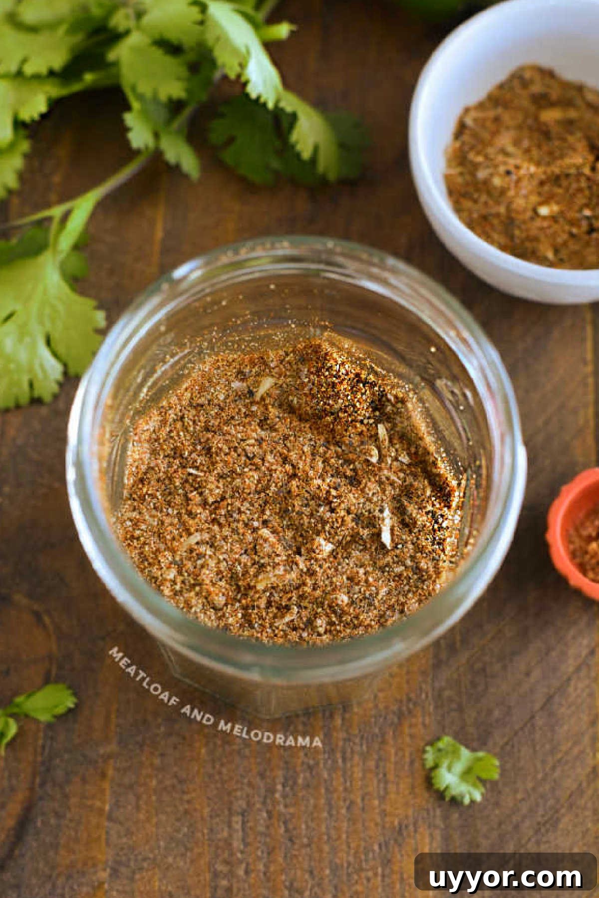 Homemade Taco Seasoning Mix for Flavorful Weeknight Tacos 2 homemade taco seasoning blend in a mason jar by cilantro