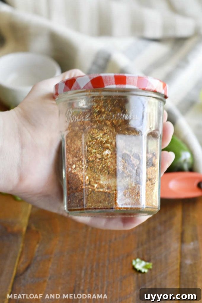 Homemade Taco Seasoning Mix for Flavorful Weeknight Tacos 4 shake spices in glass jar to blend