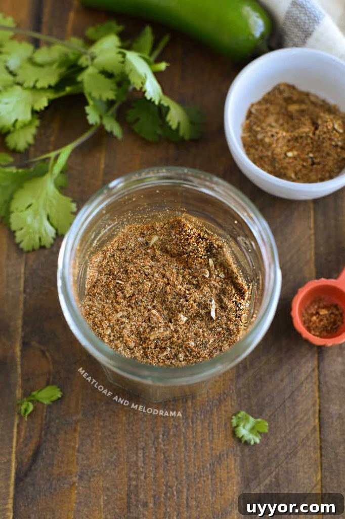 Homemade Taco Seasoning Mix for Flavorful Weeknight Tacos 5 overhead view of homemade spice mix for tacos in glass jar