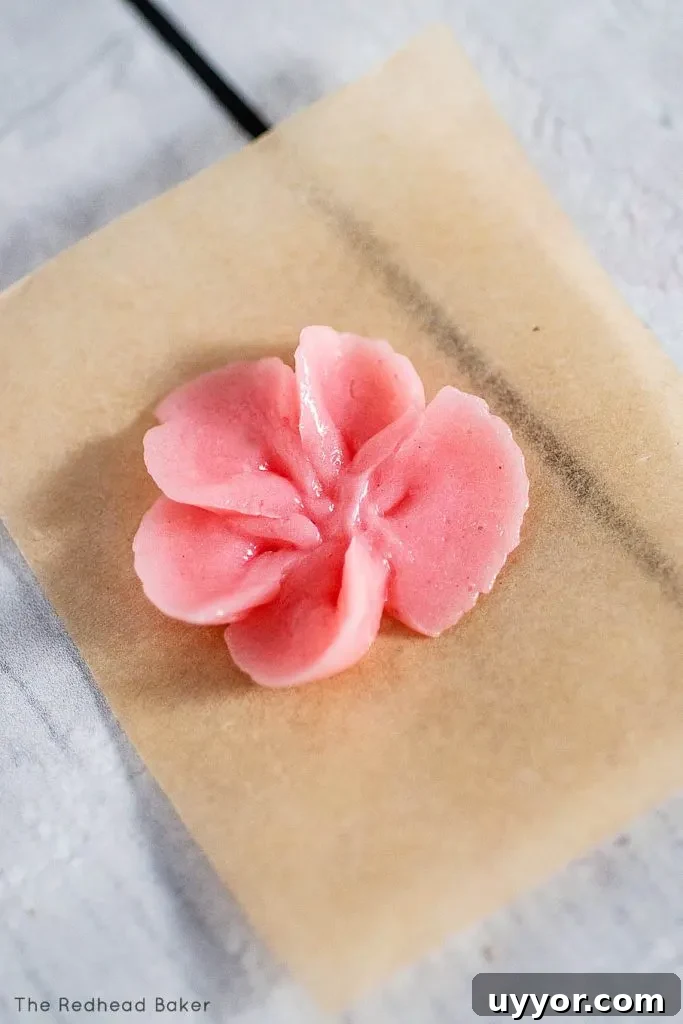 A cherry blossom piped with swiss meringue buttercream