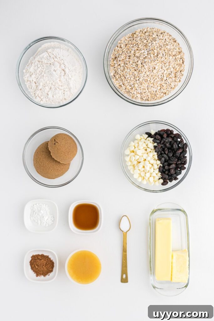 Ingredients to make soft pumpkin oatmeal cookies with white chocolate chips.