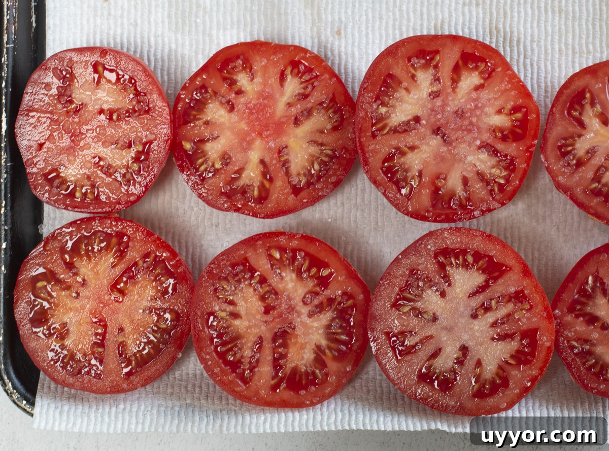Grilled Caponata: Smoky Sicilian Eggplant with Bold Flavor 6 Salted tomatoes resting on paper towels