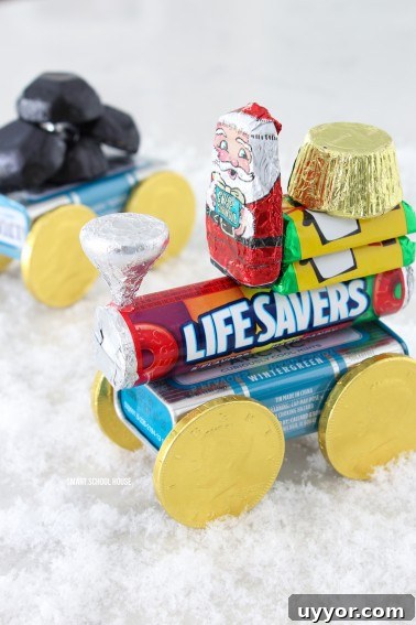 Fishbowl Snowman DIY Decor Ideas for Winter Crafting 11 Candy train for Christmas. ADORABLE! Chocolate, life savers, and an altoid tin. The best is the candy coal caboose!