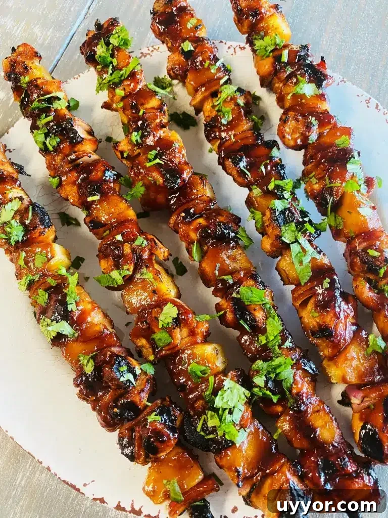 Hawaiian BBQ Chicken Skewers with Pineapple Glaze 8 Grilled Hawaiian BBQ Chicken Skewers