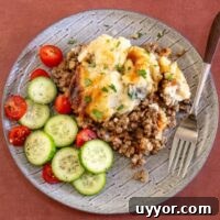 Golden baked casserole with seasoned ground beef and melted cheese.