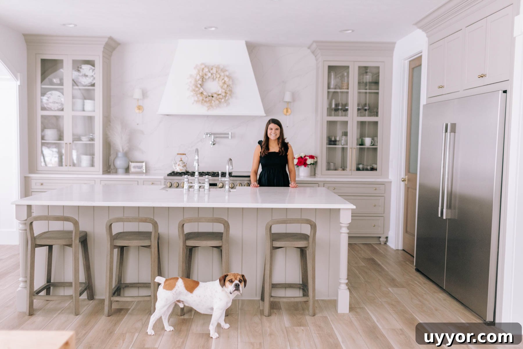 My 2024 Vision: Goals, Plans, and Roadmap for the Future 2 Allianna standing in a kitchen with a dog.