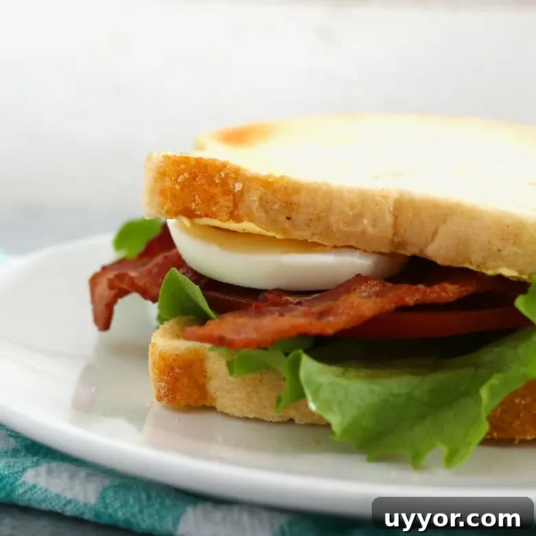 Deviled Egg BLT Sandwich Recipe: Creamy Egg Salad with Crispy Bacon 4 Preparing deviled eggs for the sandwich