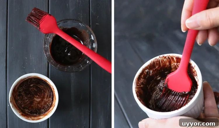 Spicy Chocolate Lava Cakes with Molten Centers 6 chocolate paste mixture being brushed on the inside of ramekins