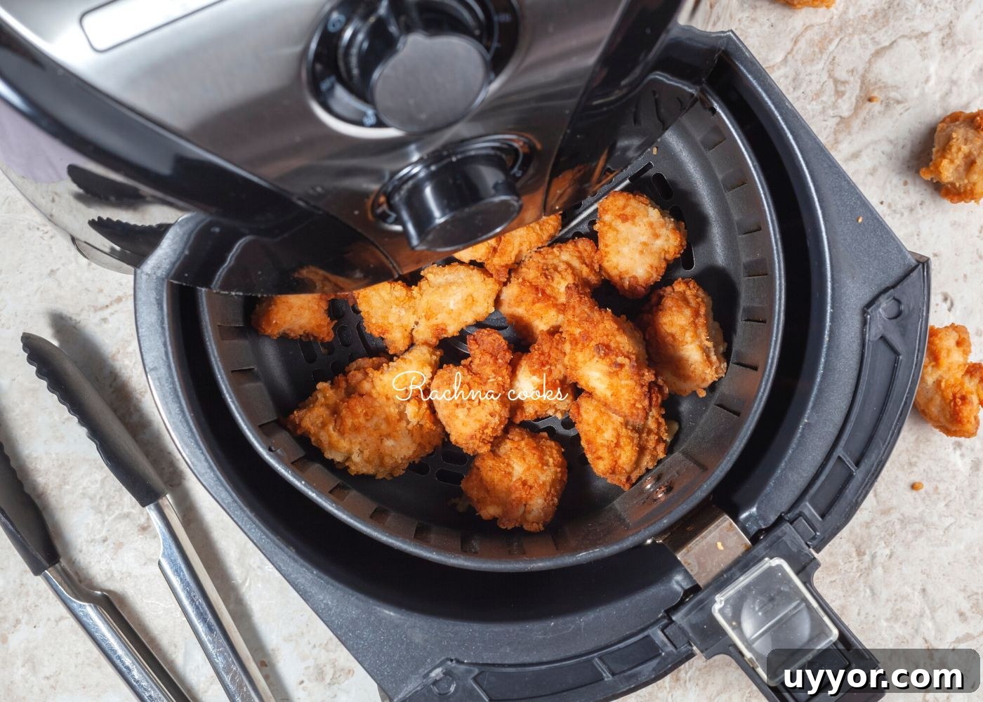 How to Reheat McDonald’s McNuggets for Crispy Results 3 Chicken nuggets being reheated in an air fryer