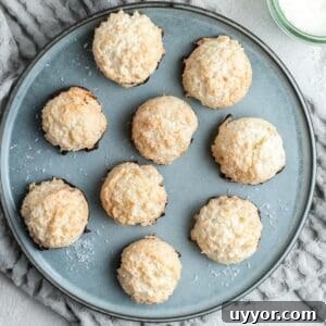 Overhead shot of round blue dish of macaroons.