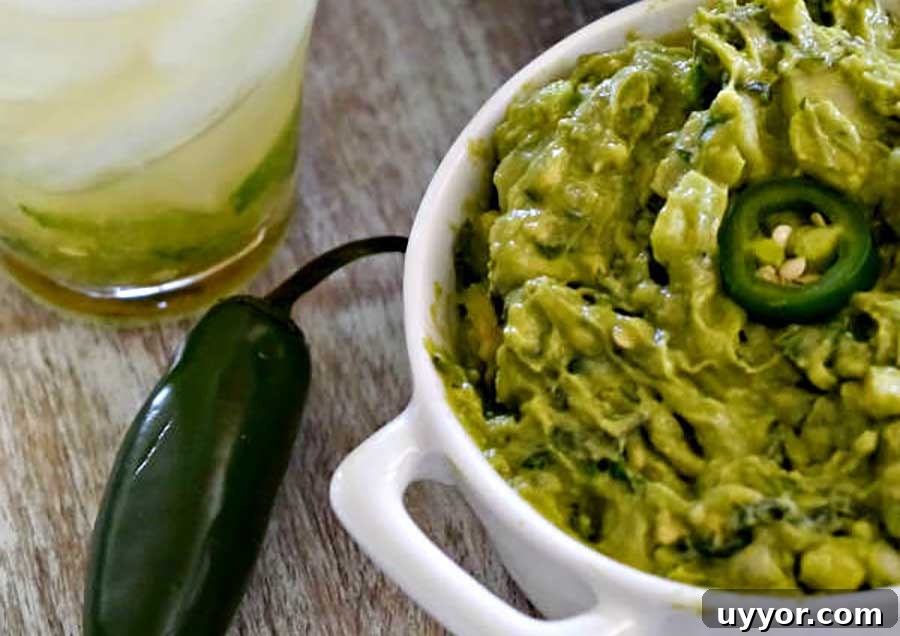 44 Gluten-Free Appetizers for Entertaining: 2026 Party Recipes 19 guacamole in a bowl with jalapenos