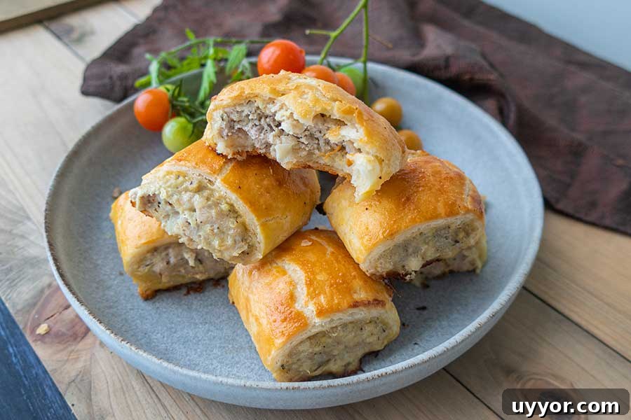44 Gluten-Free Appetizers for Entertaining: 2026 Party Recipes 3 gluten free sausage rolls on. a plate