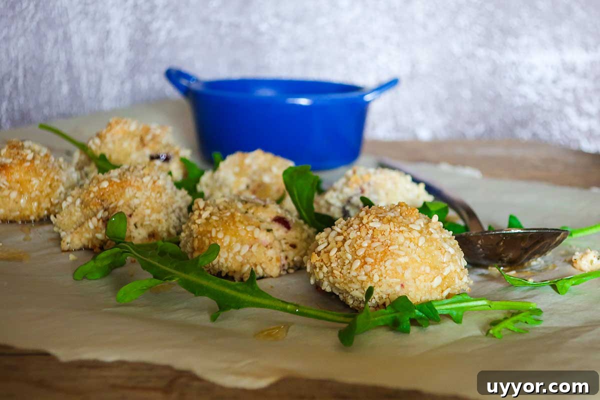 44 Gluten-Free Appetizers for Entertaining: 2026 Party Recipes 9 baked cheese balls drizzled with warm honey butter