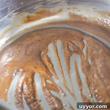 Golden brown roux in pot.