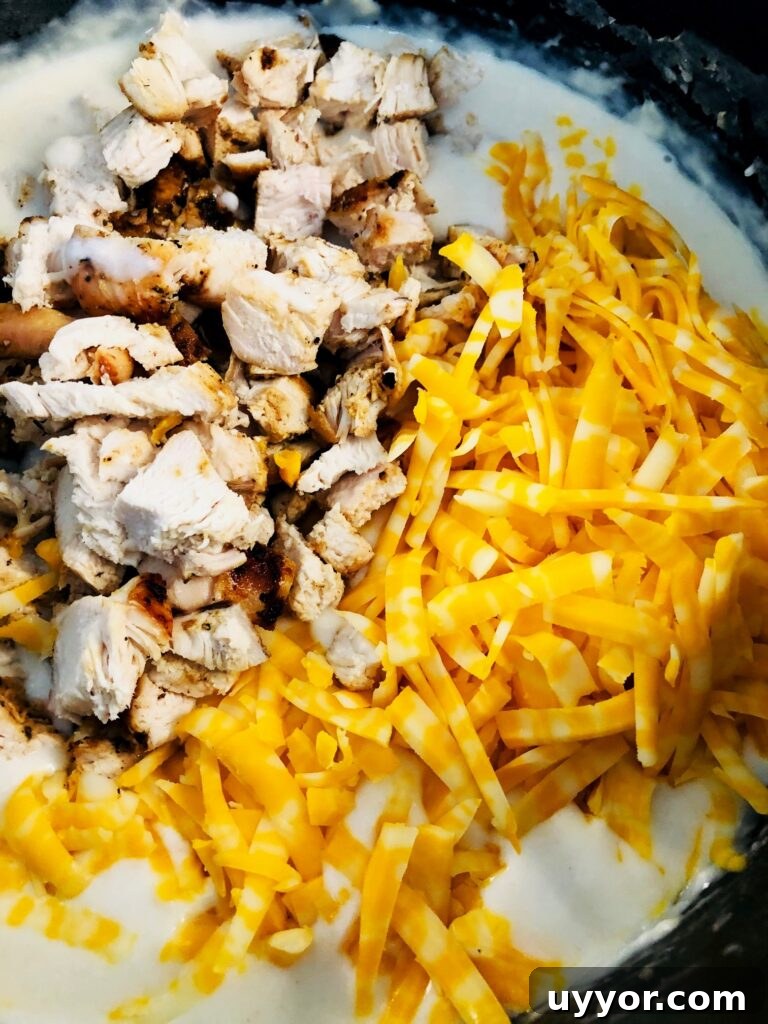 Smoked Buffalo Chicken Macaroni and Cheese Recipe 4 adding the chicken and cheese