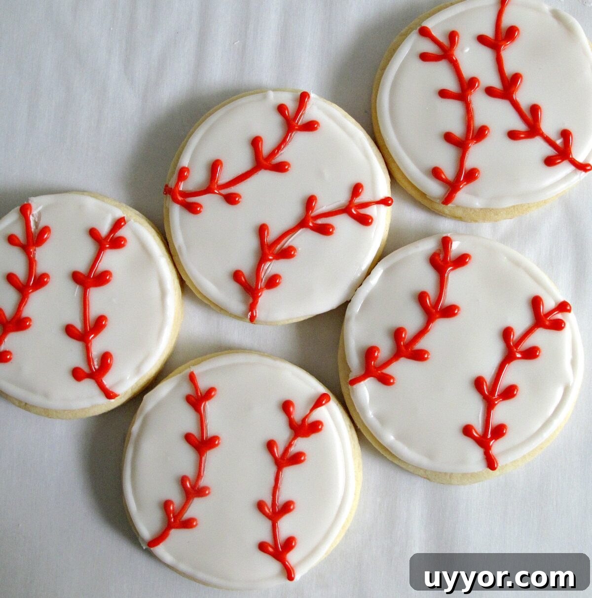 Melted Ice Cream Cookie Recipe: Soft, Gooey Summer Treat 2 Decorated baseball sugar cookies.