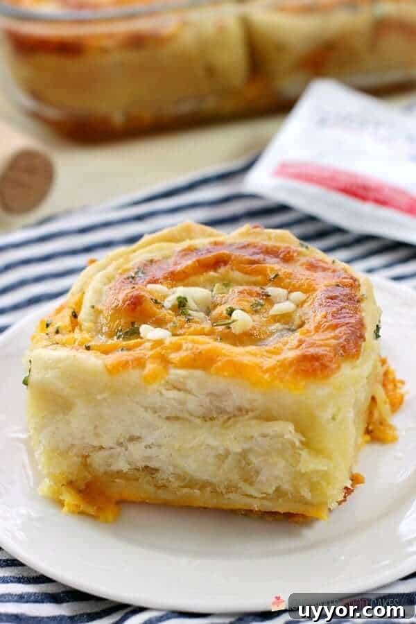 Cheesy Garlic Bread "Cinnamon" Roll in a casserole dish and on a plate close up.