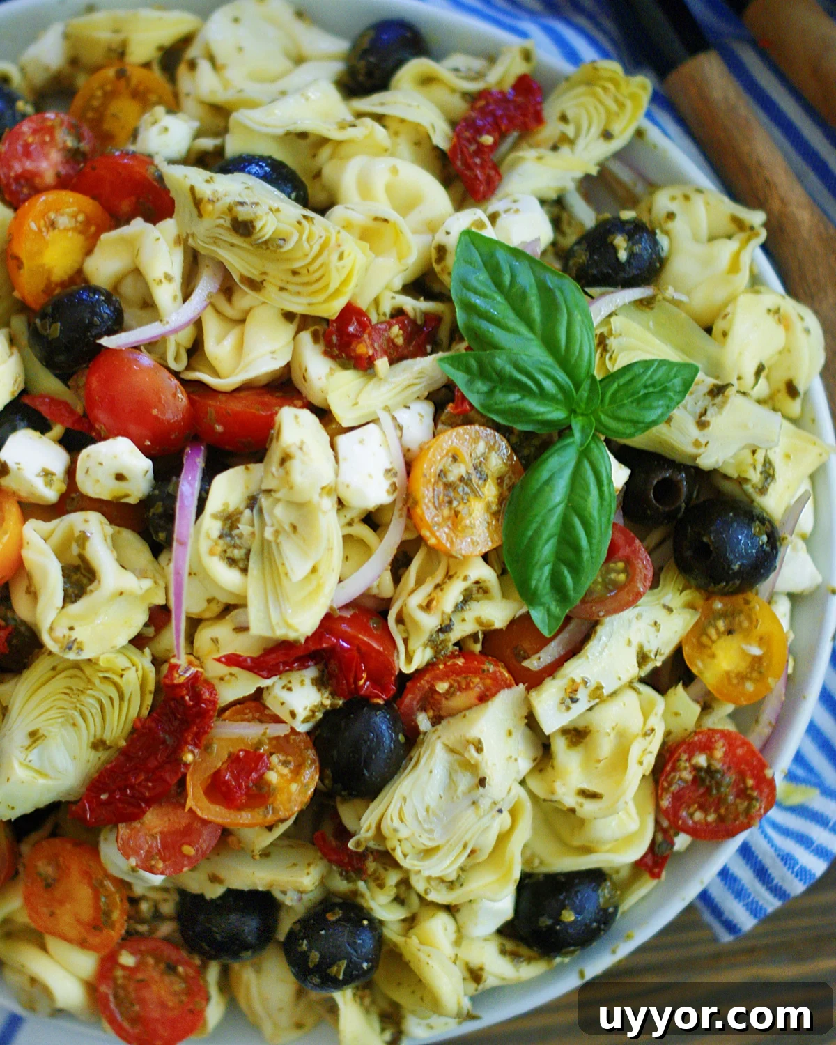 light and easy pesto pasta salad with cheese tortellini and artichokes