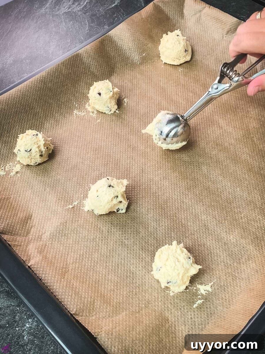 Rum-Infused Chocolate Chip Cookies: Chewy & Boozy Recipe 8 Scoop the dough into balls and evenly space them on a lined baking sheet.