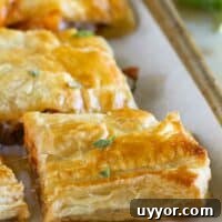 Sausage and Butternut Squash Slab Pie cut into slices.