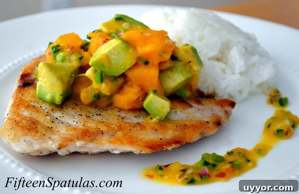 SearedSnapperMangoAvocado3 Seared Snapper - On a Plate with Mango Avocado Salsa on top and Rice in Background