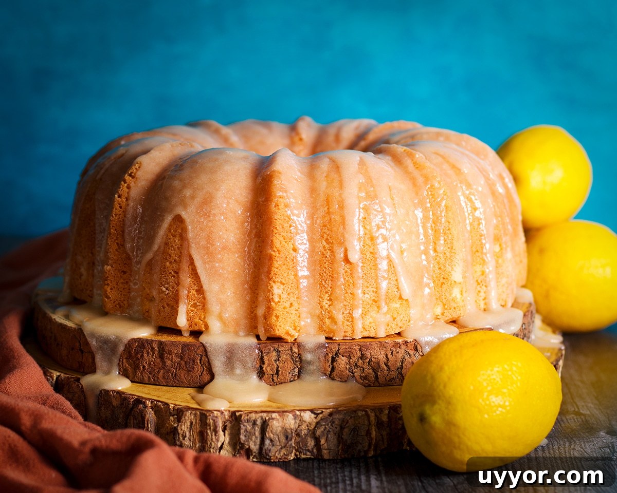 Lemon Bundt Cake with Zesty Tart Lemon Glaze 16 A lemon bundt cake covered in lemon icing and ready to eat.